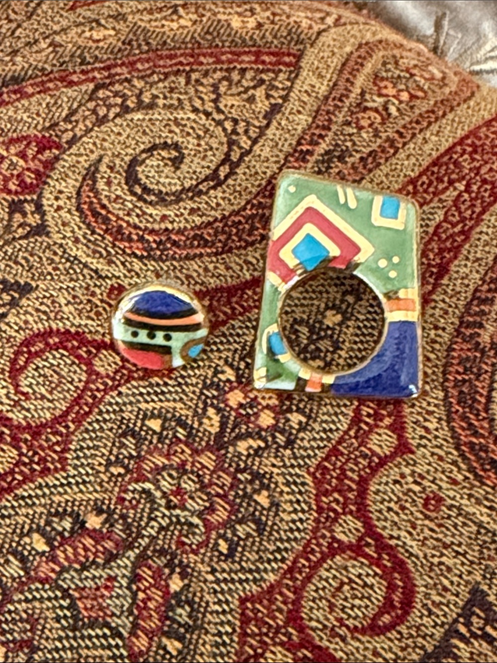 Porcelain pierced earring set circle fits inside of the larger artist’s piece